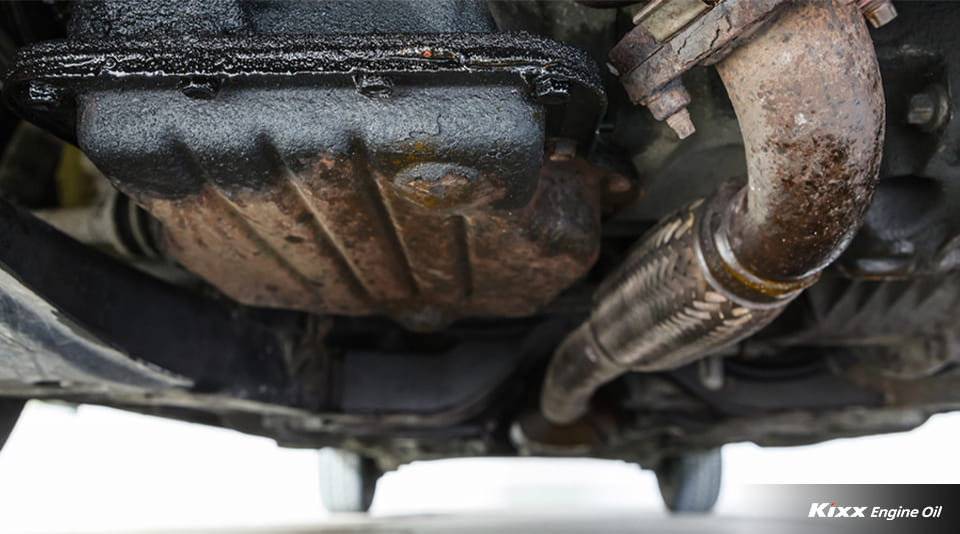 Signs of oil stains under car which can be a warning sign of oil leaks