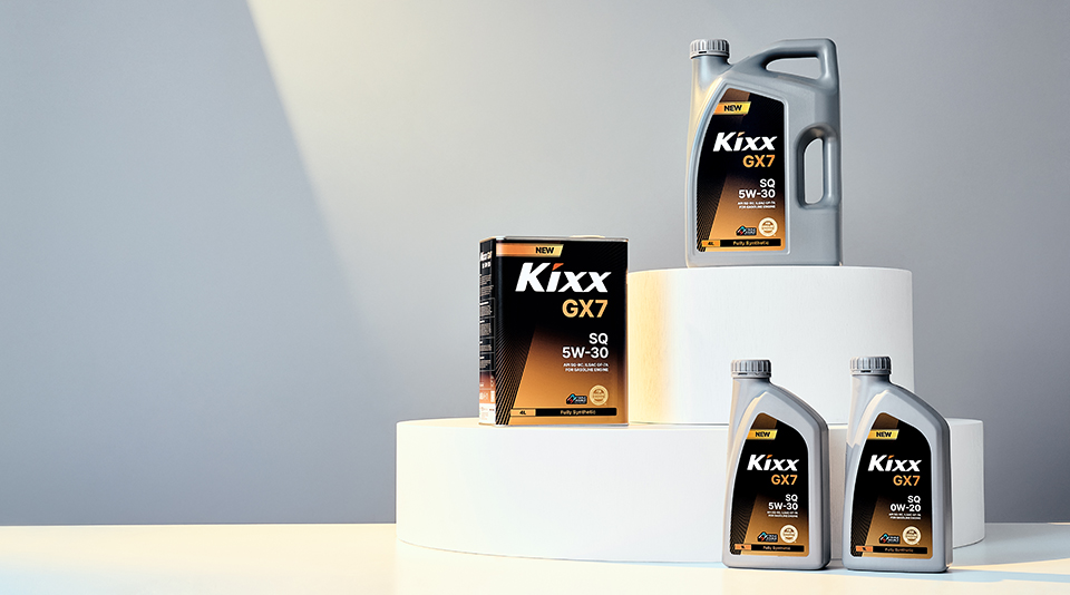 Three bottles of GX7 are displayed against a white background with a light shining on them.