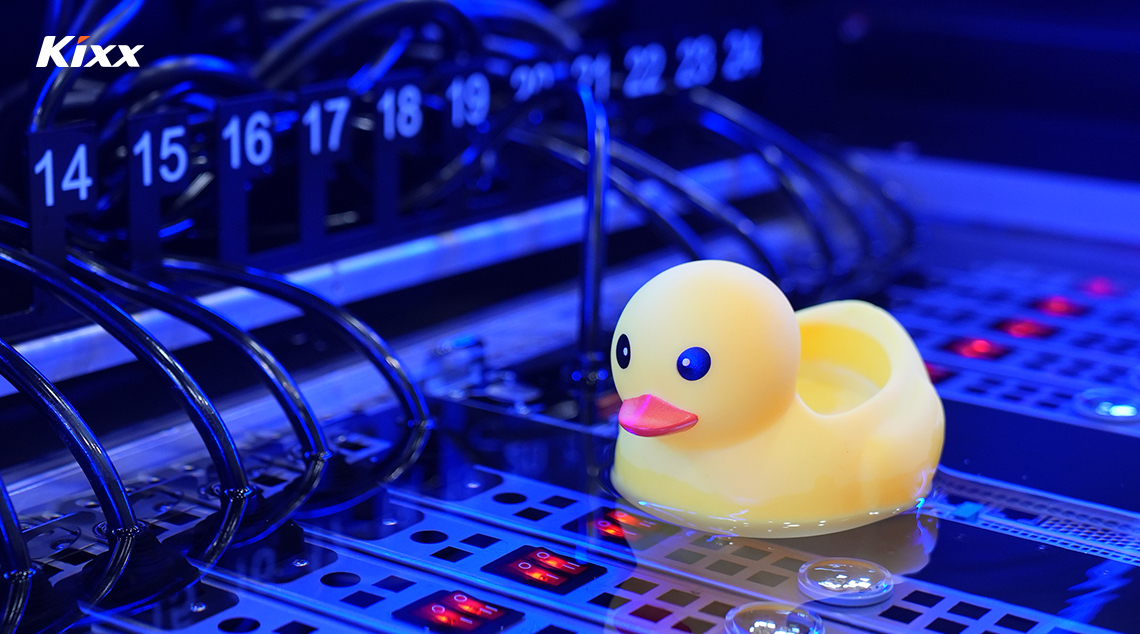 Image 4 | Kixx Newsroom Yellow rubber duck on liquid-cooled server hardware illustrating immersion cooling technology.